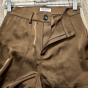 #6)  Sofia vergara soft like silk but more thicker material, cargo style pants.